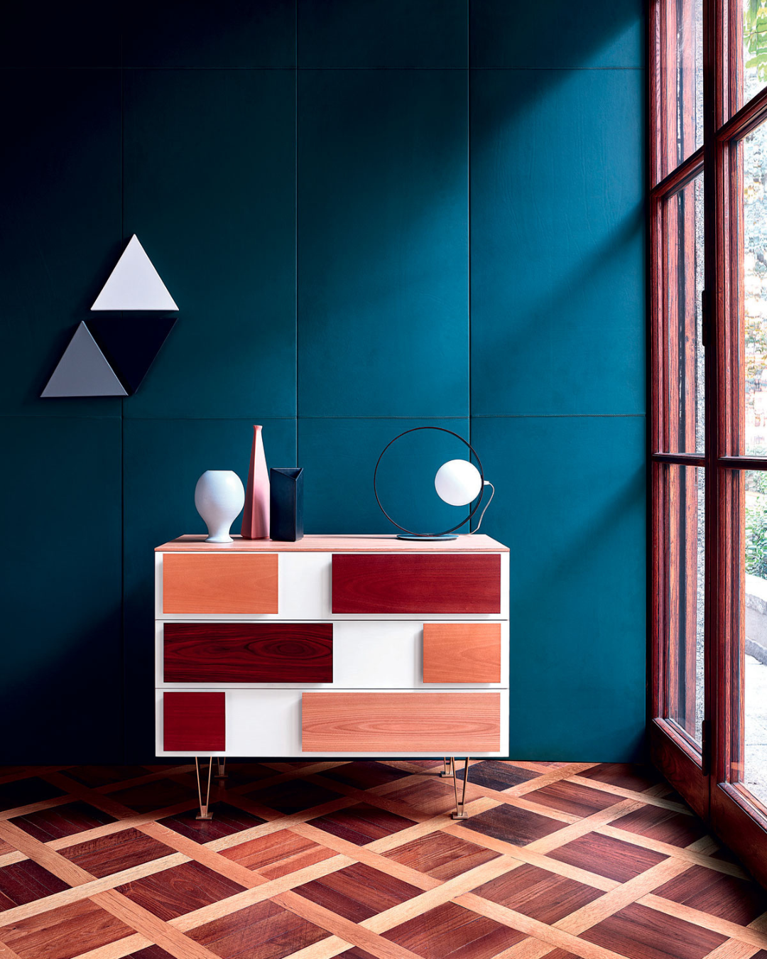 Madia D.655.1 di Giò Ponti per Molteni&C, un mix di artigianato e modernità.