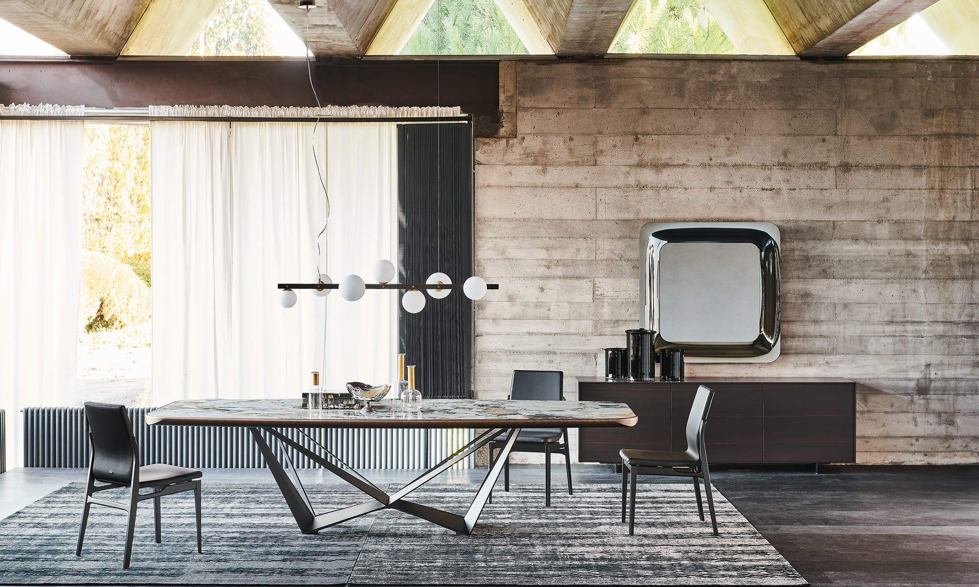 Tavolo Cattelan Italia in ceramica in un ambiente dining di design contemporaneo